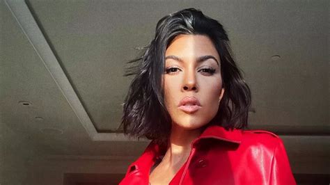 Kourtney Kardashian stuns in barely.